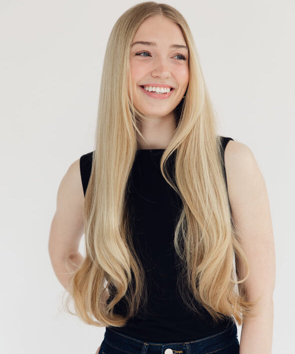 Blonde woman's headshot for a testimony for the LiM Method and how it changed the game for her pelvic floor function and wellness. 